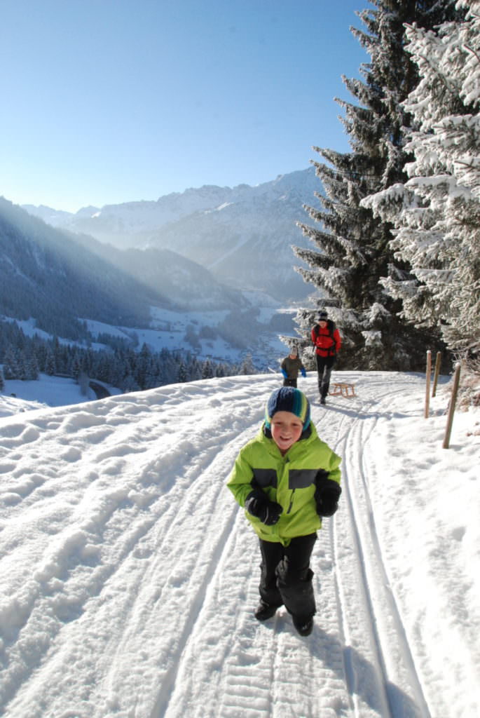 Rodelbahn Bayern -  hier beim Schlittenfahren im Allgäu